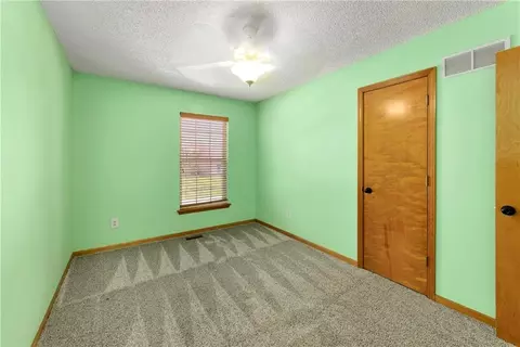 Bedroom - 644 SE Jonathon Ave, Lees Summit, MO 64063 photo 8 of 9