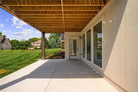 Exterior - 4209 NE Hideaway Dr, Lees Summit, MO 64064 photo 6 of 9