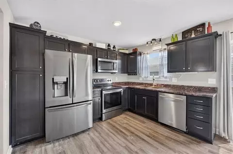 Kitchen - 213 Pointe Ln, Raymore, MO 64083 photo 1 of 3