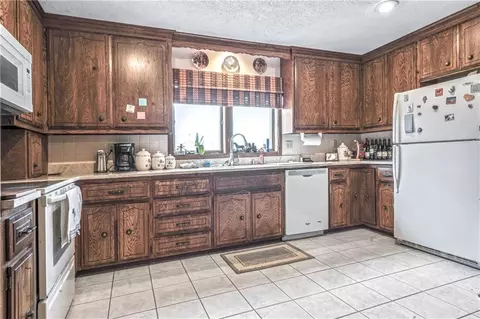 Kitchen - 33421 Mcclellen Rd, Drexel, MO 64742 photo 1 of 1
