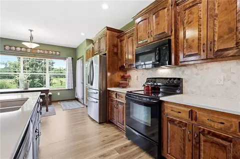Kitchen - 31502 E Heidelberger Rd, Buckner, MO 64016 photo 3 of 11