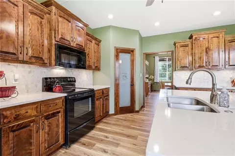Kitchen - 31502 E Heidelberger Rd, Buckner, MO 64016 photo 7 of 11