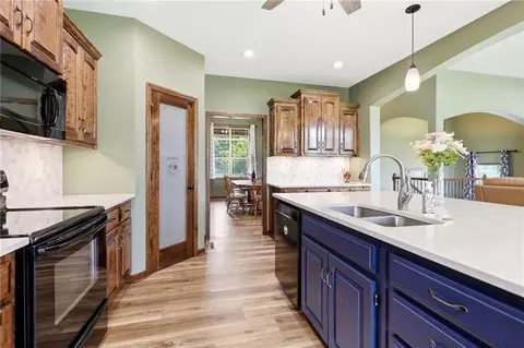 Kitchen - 31502 E Heidelberger Rd, Buckner, MO 64016 photo 8 of 11