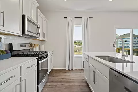 Kitchen - 706 Solstice Cir, Belton, MO 64012 photo 2 of 4