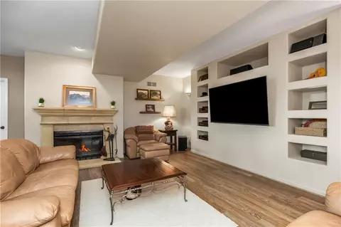 Living - 4317 NE Maplegate Ct, Lees Summit, MO 64064 photo 4 of 5