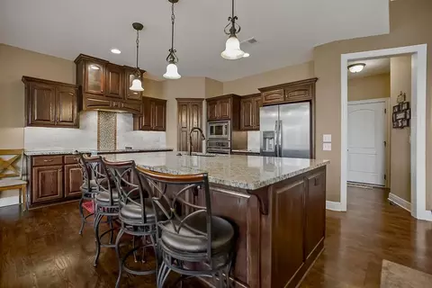 Kitchen - 1422 Brompton Ln, Raymore, MO 64083 photo 2 of 3