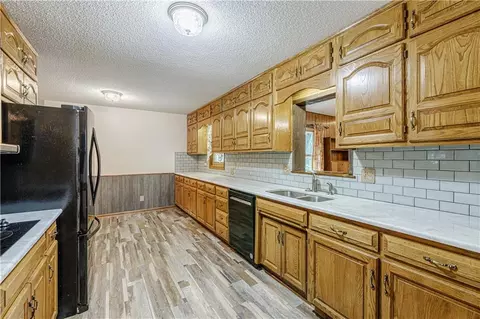 Kitchen - 700 S Alexander Rd, Independence, MO 64056 photo 3 of 4