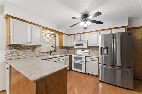 Kitchen - 617 W Maple St, Raymore, MO 64083 photo 1 of 9