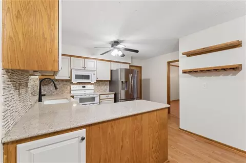Kitchen - 617 W Maple St, Raymore, MO 64083 photo 3 of 9