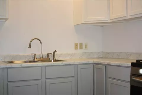 Kitchen - 208 SE 10212 P Ln, Deepwater, MO 64740 photo 3 of 7