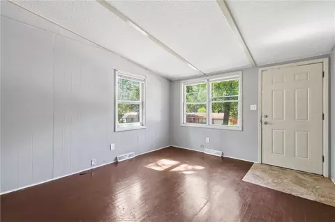 Living - 10819 E Westport Rd, Independence, MO 64052 photo 2 of 6
