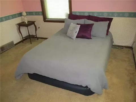 Bedroom - 214 W 7th St, Cameron, MO 64429 photo 1 of 6