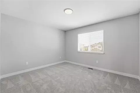Bedroom - 707 Glenn Cir, Raymore, MO 64083 photo 7 of 10