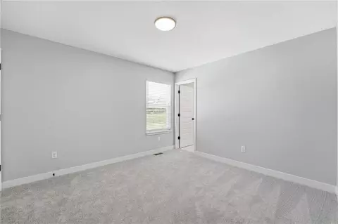 Bedroom - 707 Glenn Cir, Raymore, MO 64083 photo 3 of 10