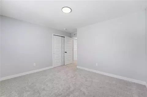 Bedroom - 707 Glenn Cir, Raymore, MO 64083 photo 8 of 10