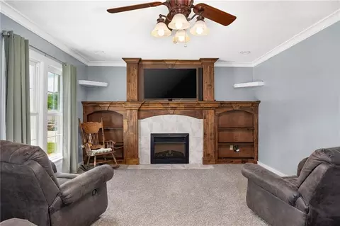 Living - 109 E Chestnut St, Hamilton, MO 64644 photo 2 of 2