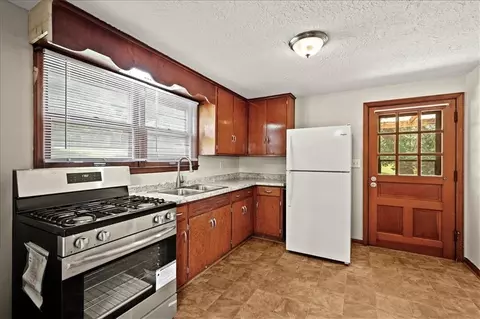 Kitchen - 8905 E 55th St, Raytown, MO 64133 photo 2 of 4