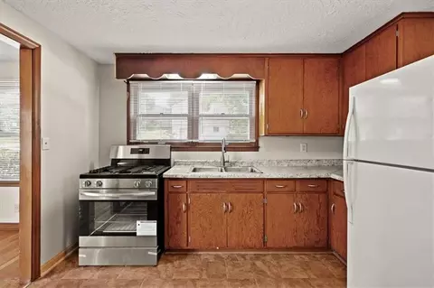 Kitchen - 8905 E 55th St, Raytown, MO 64133 photo 3 of 4