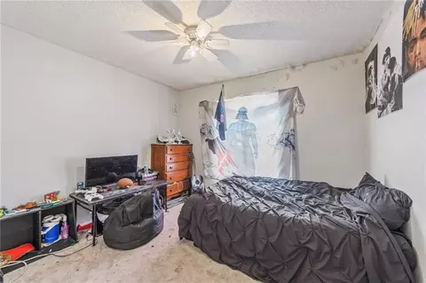 Bedroom - 403 NE Station Dr, Lees Summit, MO 64086 photo 6 of 8