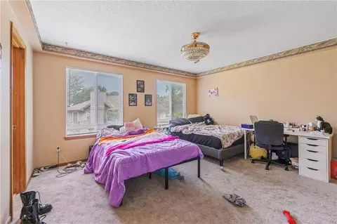 Bedroom - 403 NE Station Dr, Lees Summit, MO 64086 photo 1 of 8