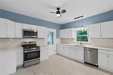 Kitchen - 721 W 4th St, Cameron, MO 64429 photo 1 of 2