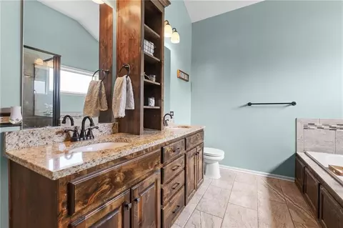 Bath - 115 E Maple St, Lone Jack, MO 64070 photo 1 of 4