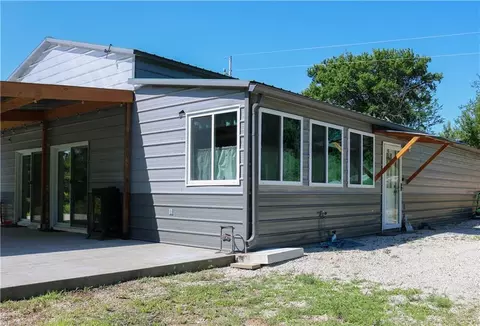 Exterior - 10259 S Perry Rd, Orrick, MO 64077 photo 4 of 13