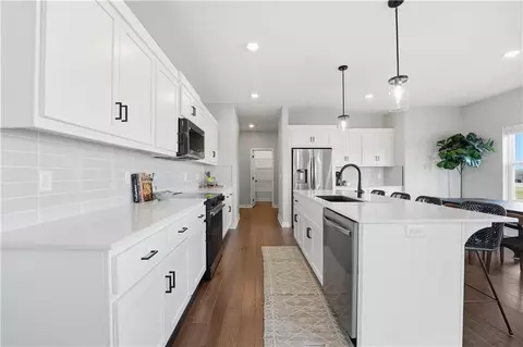 Kitchen - 1110 Sendera Trl, Raymore, MO 64083 photo 2 of 2