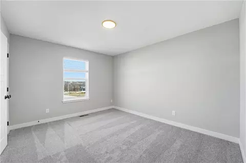 Bedroom - 1110 Sendera Trl, Raymore, MO 64083 photo 4 of 6