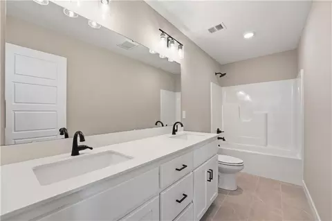 Bath - 1110 Sendera Trl, Raymore, MO 64083 photo 2 of 3