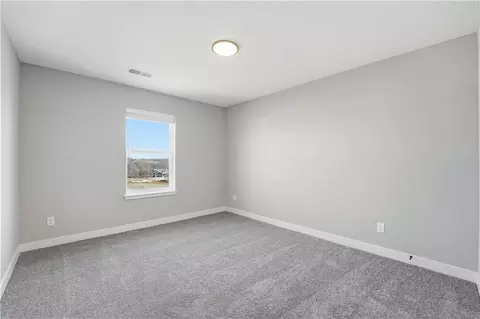 Bedroom - 1110 Sendera Trl, Raymore, MO 64083 photo 2 of 6