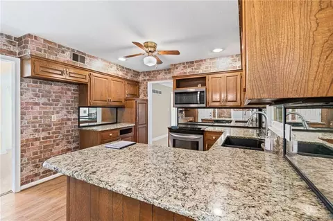 Kitchen - 320 SE Westwind Dr, Lees Summit, MO 64063 photo 2 of 3