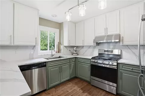 Kitchen - 204 N Walker Dr, Raymore, MO 64083 photo 2 of 6