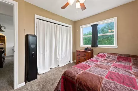 Bedroom - 104 W 4th St, Freeman, MO 64746 photo 1 of 2
