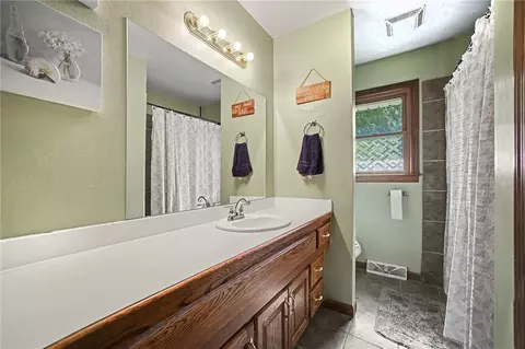 Bath - 120 Baker St, Buckner, MO 64016 photo 1 of 2