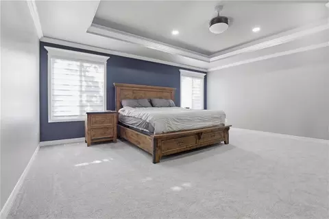 Bedroom - 1502 Cross Creek Dr, Raymore, MO 64083 photo 9 of 11