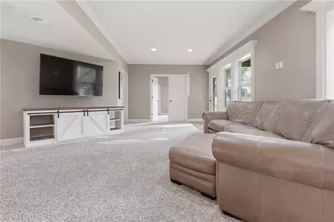 Living - 1502 Cross Creek Dr, Raymore, MO 64083 photo 6 of 7