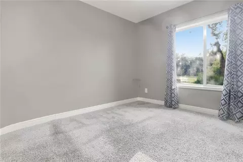 Bedroom - 1502 Cross Creek Dr, Raymore, MO 64083 photo 11 of 11