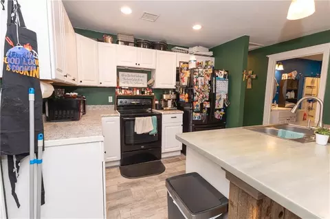 Kitchen - 1004 E Main St, Cherryvale, KS 67335 photo 3 of 4