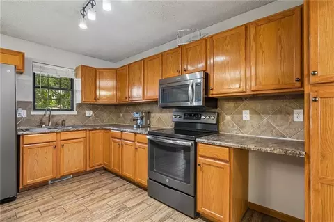 Kitchen - 112 E Frank St, Kearney, MO 64060 photo 2 of 4