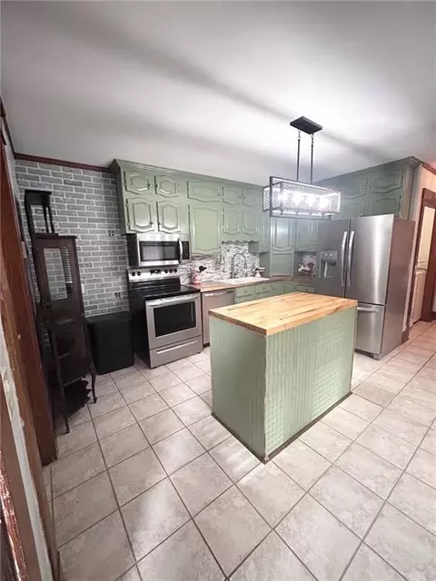 Kitchen - 210 S Sallie St, Mayview, MO 64071 photo 2 of 2