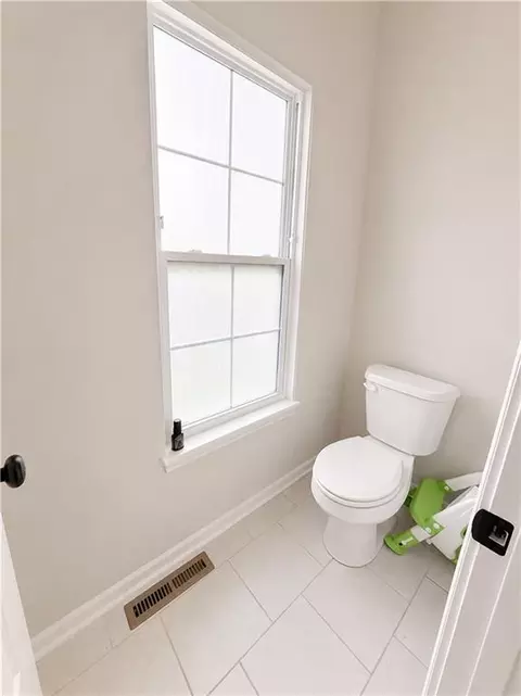 Bath - 610 E 11th St, Kearney, MO 64060 photo 5 of 6