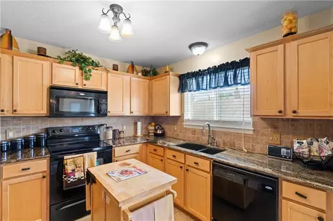 Kitchen - 1147 SW Arborfair Dr, Lees Summit, MO 64082 photo 2 of 2