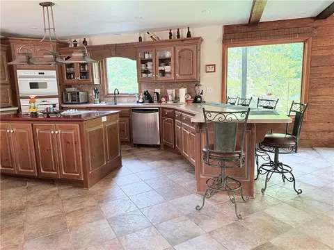 Kitchen - 3907 NE Beach Rd, Lees Summit, MO 64064 photo 6 of 6