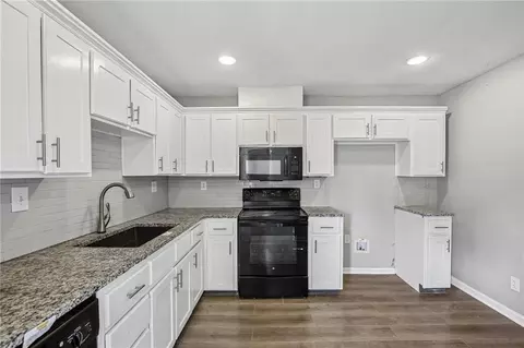 Kitchen - 112 W Pine St, Drexel, MO 64742 photo 1 of 1