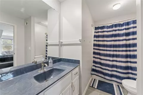 Bath - 1005 Wesley Ave, Raymore, MO 64083 photo 5 of 7