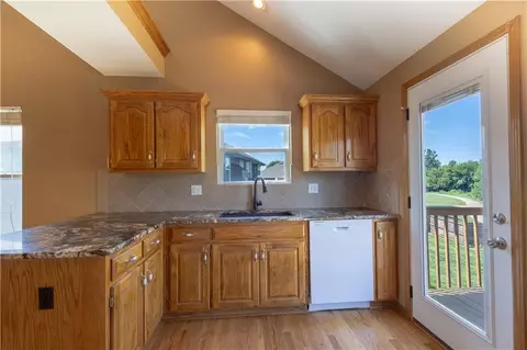 Kitchen - 722 Garnes St, Raymore, MO 64083 photo 1 of 1