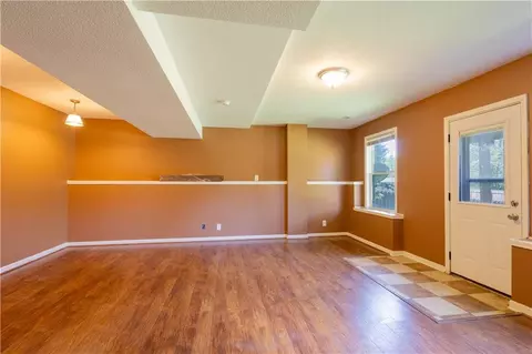 Living - 722 Garnes St, Raymore, MO 64083 photo 4 of 5