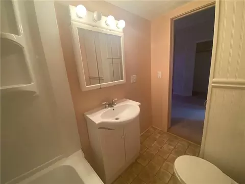 Bath - 15 E 6th St, Adrian, MO 64720 photo 2 of 3