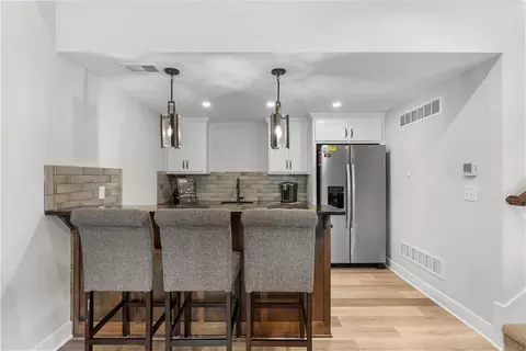 Kitchen - 1109 SW Brookside Ct, Lees Summit, MO 64064 photo 7 of 8
